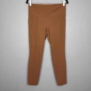 Athleta Salutation Stash Tight Camel Brown High Rise Active Leggings size Large